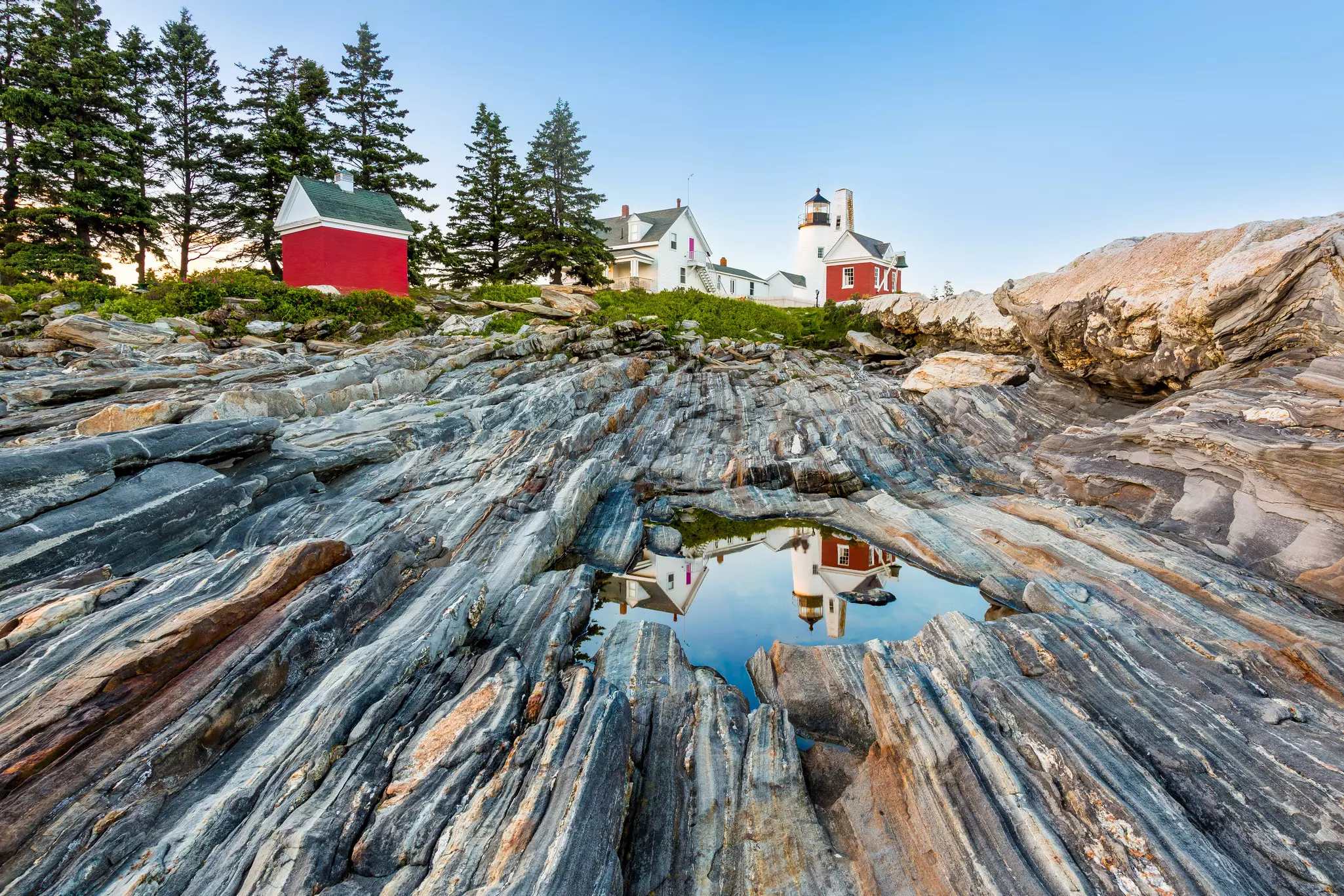 Kids can clamber along rocks peppered with mesmerizing tide pools at Pemaquid Point © Photography by Deb Snelson / Getty Images