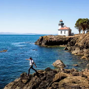 Caucasian man walking on rocks near the lighthouse on San Juan Island, Washington
shoreline, person, scenery, panoramic, nature, sea, lighthouse, coast, San Juan Island, Washington