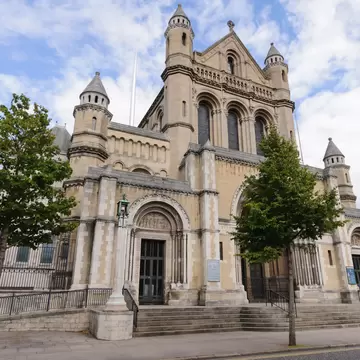 Exterior of Saint Anne's Cathedral in Belfast, Ireland.  Blue sky above.