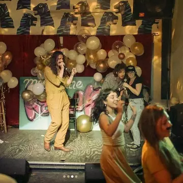 Karaoke at Hole in the Wall is a great way to spend a weeknight. Courtesy of Hole in the Wall