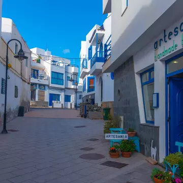 El Cotillo, Spain, Janury 25, 2021: Narrow street at El Cotillo village at Fuerteventura, Canary islands, Spain