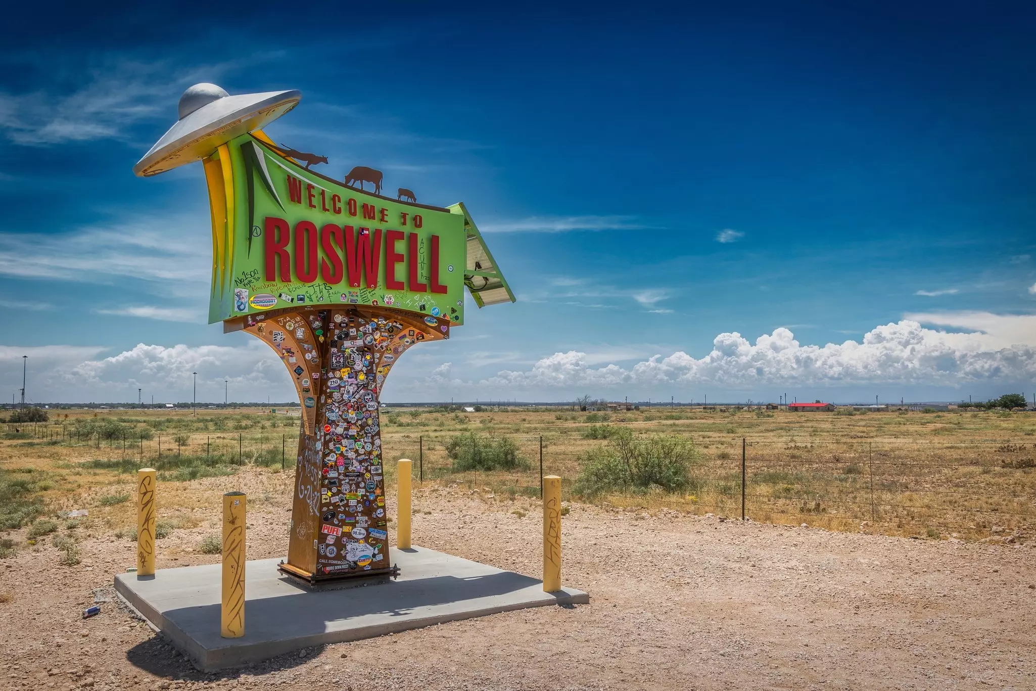 The colorful sign, north of the city on highway 285, welcoming travelers to Roswell