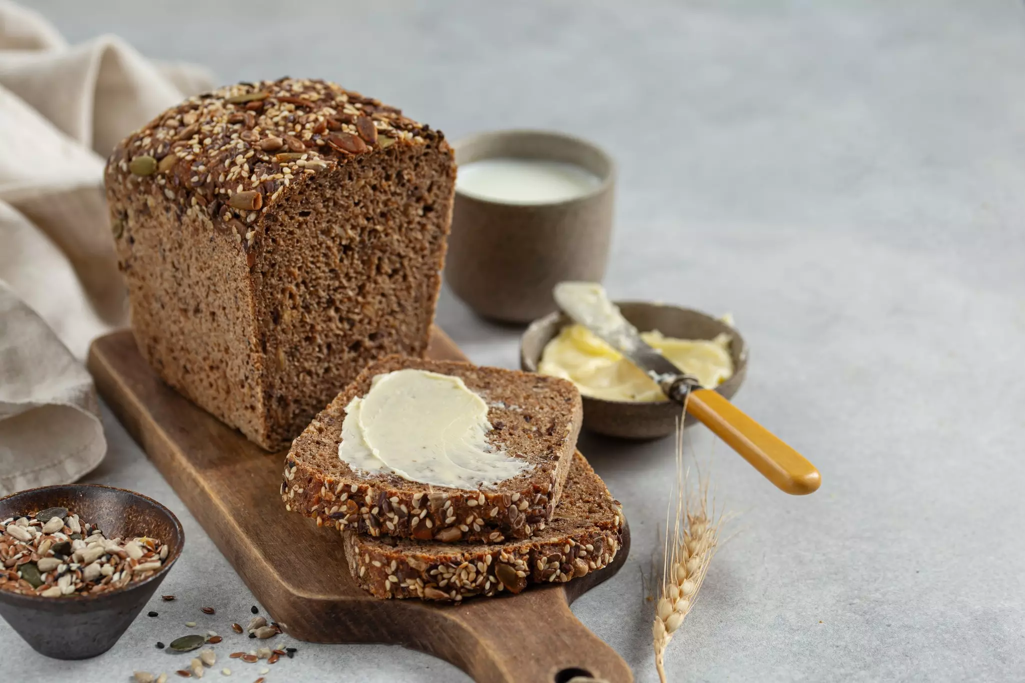 A load of rye bread on a wooden platter