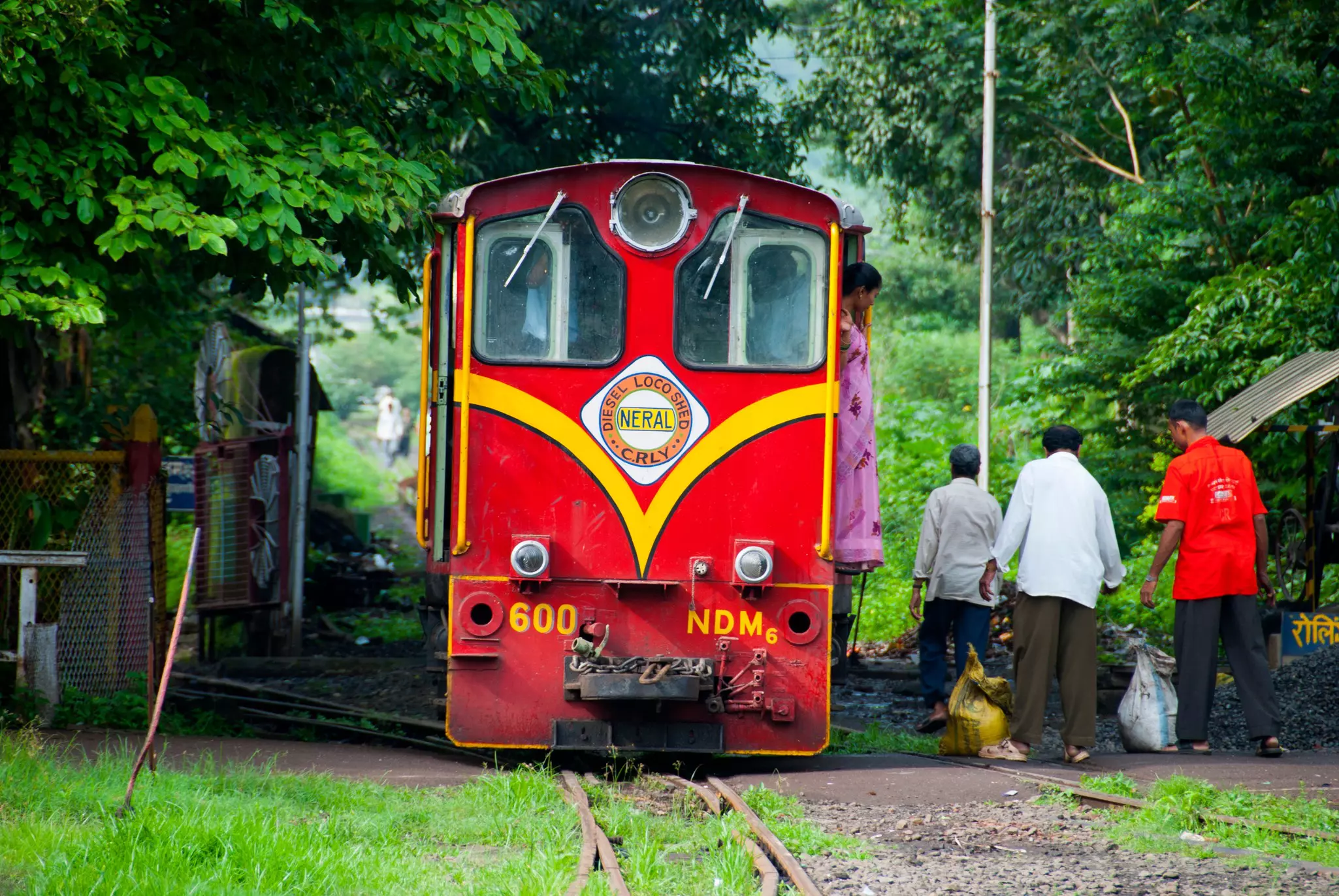 The Matheran Hill Railway heritage train filling with passangers, India.