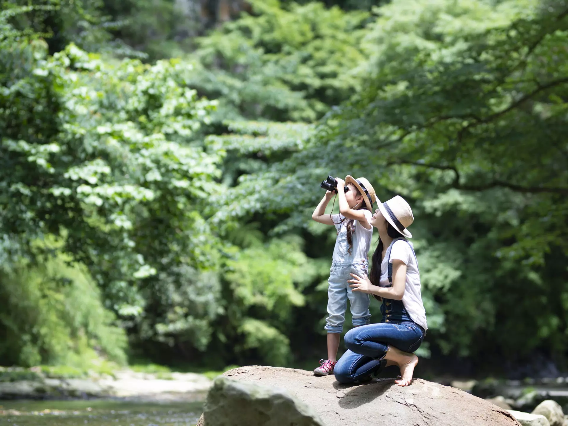 Mother kneeling beside her daughter who is looking through binoculars near a river.
992111374
Daughter, Exploration, Caucasian Ethnicity, Horizontal, Playing, Simple Living, Outdoor Pursuit, Bib Overalls, Playful, Research, Sunlight, Carefree, Photography, Cute, Outdoors, Childhood, Togetherness, Straw Hat, Telescope, Parent, Adventure, Affectionate, Camping, Relaxation, Family with One Child, Child, Family, Enjoyment, Females, Two People, Adult, Nature, Japanese Ethnicity, Happiness, Women, Cheerful, Lifestyles, One Parent, Summer, Love - Emotion, Japan, Curiosity, Love You, Extreme Sports, People, Watching, Girls, Joy, Binoculars, Single Mother, Mother, Fun, Mixed Race Person, Beauty, Water, River