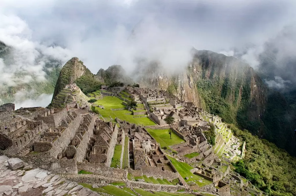 Clouds part over the ruins of Machu Picchu in Peru. 