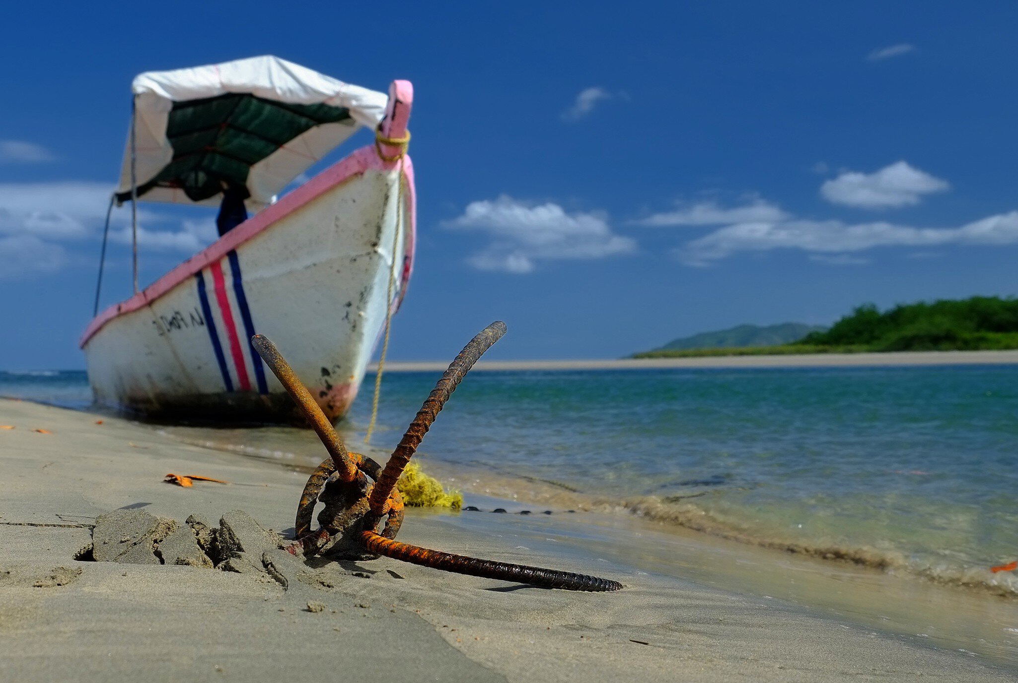 Anchored boat on beach, Costa Rica