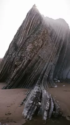 The Flysch Route on the Basque Coast features rugged cliffs showcasing millions of years of geology.