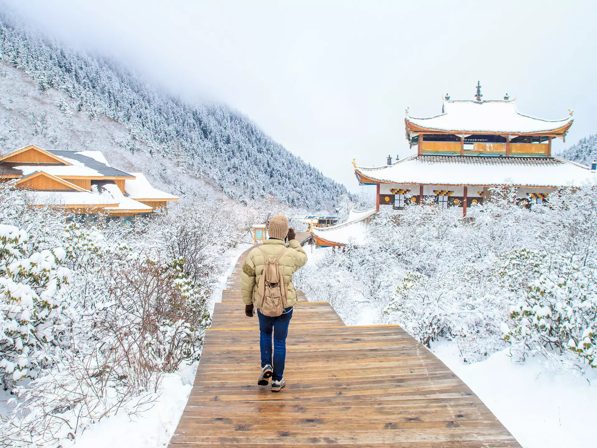 Traveler walking on the snow in Snow season, China  License Type: media  Download Time: 2021-10-22T09:09:19.000Z  User: AMccarthy_lonelyplanet  Is Editorial: No  purchase_order:   