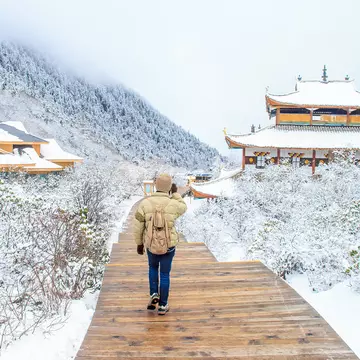 Traveler walking on the snow in Snow season, China  License Type: media  Download Time: 2021-10-22T09:09:19.000Z  User: AMccarthy_lonelyplanet  Is Editorial: No  purchase_order:   
