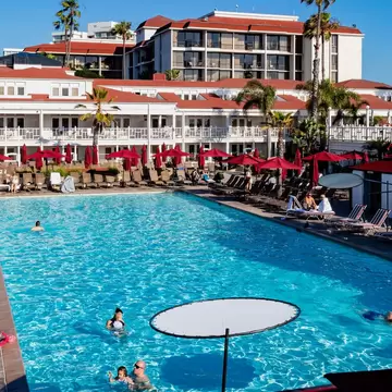 San Digeo, MAY 28 2015 - Sunny view of the swimming pool of Historical Hotel del Coronado, License Type: media, Download Time: 2025-02-07T15:13:24.000Z, User: Ppeterson948, Editorial: true, purchase_order: 56530 - Guidebooks, job: Global Publishing WIP, client: Global Publishing WIP, other: Pia Peterson Haggarty
