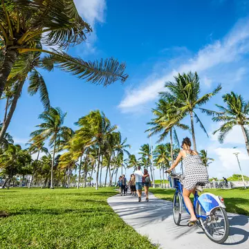 If you don't have far to travel, Citi Bikes can be a great way to see the sights in Miami while keeping costs down. lazyllama/Shutterstock