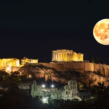 1 January 2018, Athens Greece: The Acropolis of Athens photographed from the nearby Pnyka, the place where ancient Athenians gathered to debate democracy. The picture is made in the full moon of January 2018. The main building in the picture is the Parthenon, dedicated to goddess Athena. In the foreground, the roman theater build by Hero? can be seen
1 January 2018, Athens Greece: The Acropolis of Athens photographed from the nearby Pnyka, the place where ancient Athenians gathered to debate democracy. The picture is made in the full moon of January 2018. The main building in the picture is the Parthenon, dedicated to goddess Athena. In the foreground, the roman theater build by Heroδ can be seen
902184352
Greek Culture, UNESCO World Heritage Site, Photography, Old, No, No People, Old Ruin, Acropolis - Athens, Vacations, Athena - Greek Goddess, Attica, Amphitheater, Parthenon - Athens, Ancient, Illuminated, Light Effect, Greece, Athens, Hill, Supermoon, Classical Style, Temple - Building, Travel Destinations, Horizontal, Classical Greek, Dusk, Capital Cities, Famous Place, Lighting Equipment, Night, Scaffolding, Moon, Ancient Civilization, Ancient Greece, Athens - Greece, Elgin Marbles, Full Moon