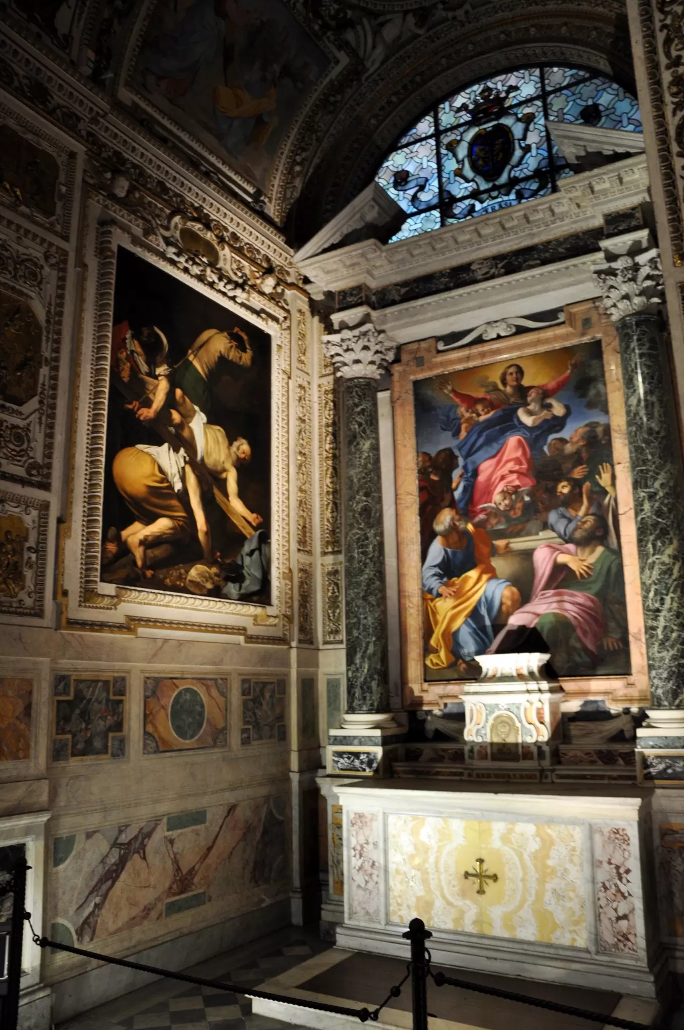 Paintings by Caravaggio and Carracci in the Cerasi Chapel in the Basilica Santa Maria del Popolo in Rome, Italy.