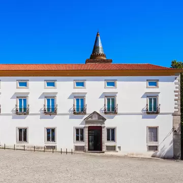 Exterior view of the Museu Nacional Frei Manuel do Cenáculo on a sunny day in Évora, Portugal.