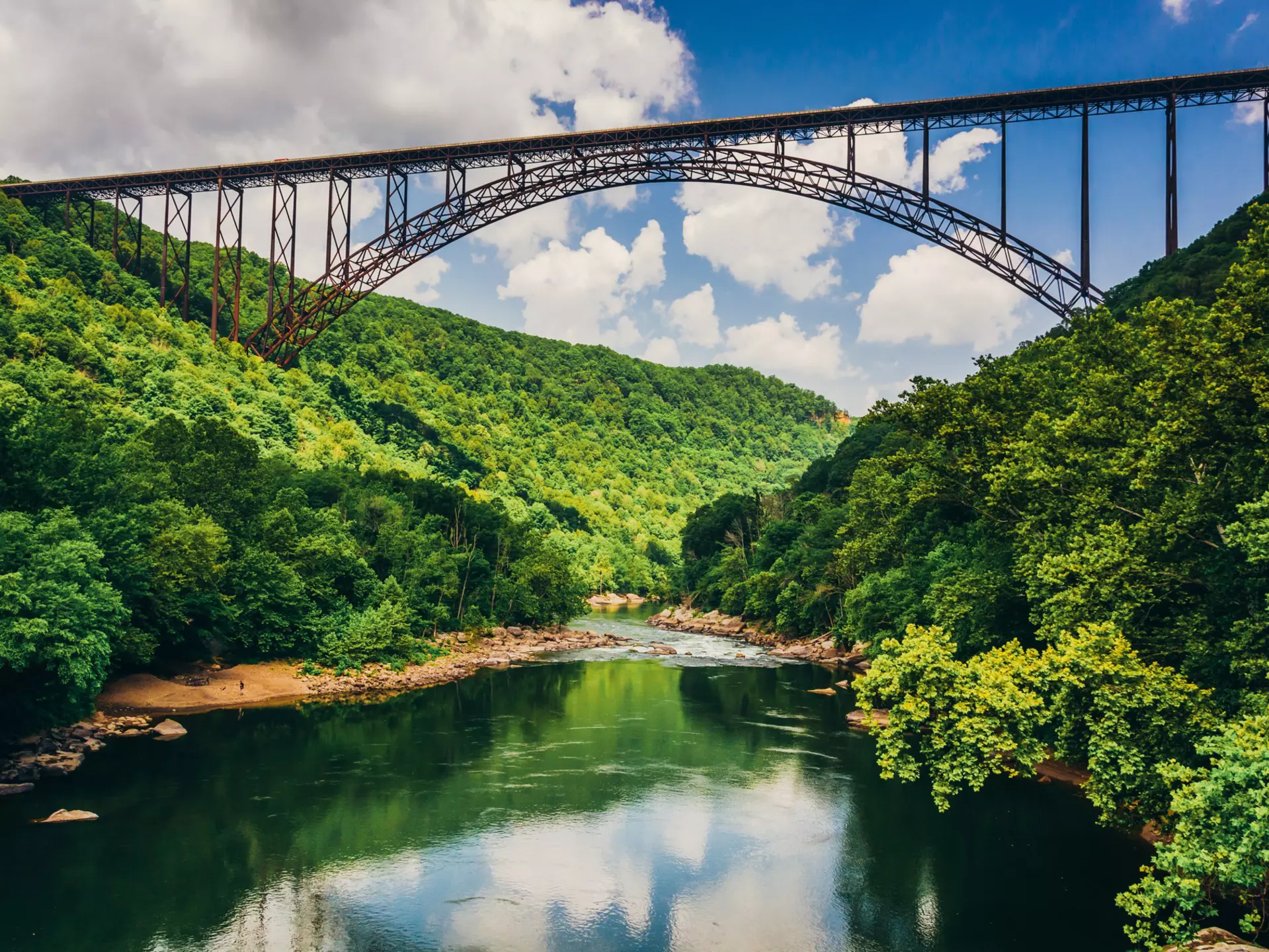 The New River Gorge Bridge, as seen from Fayette Station Road.
213594991
park, green, river, travel, appalachian, allegheny, mountains, trees, scenery, gorge, clouds, forest, canyon, blue, wilderness, outdoors, slopes, sky, scenic, tourism, appalachia, beautiful, water, nature, landscape, new, virginia, west