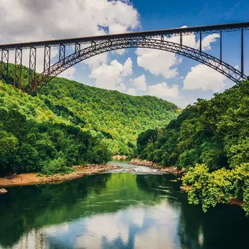 The New River Gorge Bridge, as seen from Fayette Station Road.
213594991
park, green, river, travel, appalachian, allegheny, mountains, trees, scenery, gorge, clouds, forest, canyon, blue, wilderness, outdoors, slopes, sky, scenic, tourism, appalachia, beautiful, water, nature, landscape, new, virginia, west