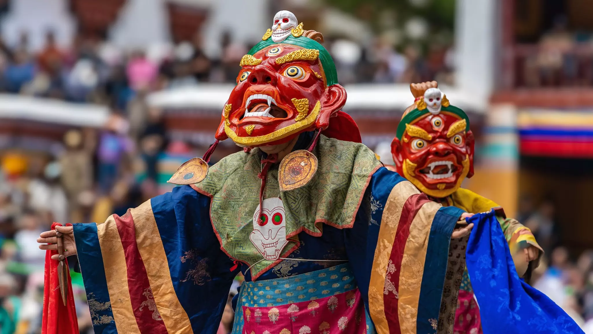 A colorful mask dance being performed at Hemis Monastery at Leh, Ladakh India.