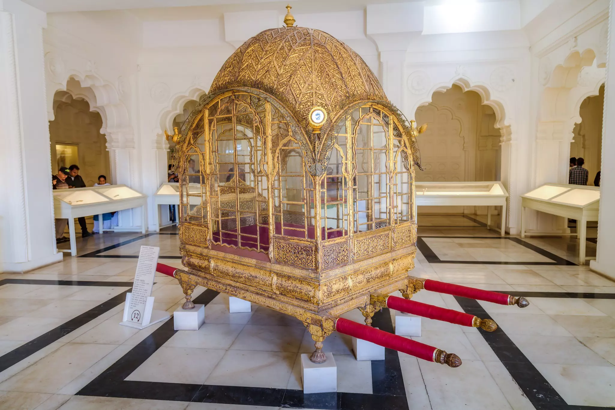A gilden royal palanquin on display at the museum in Mehrangarh Fort, Jodhpur, India.