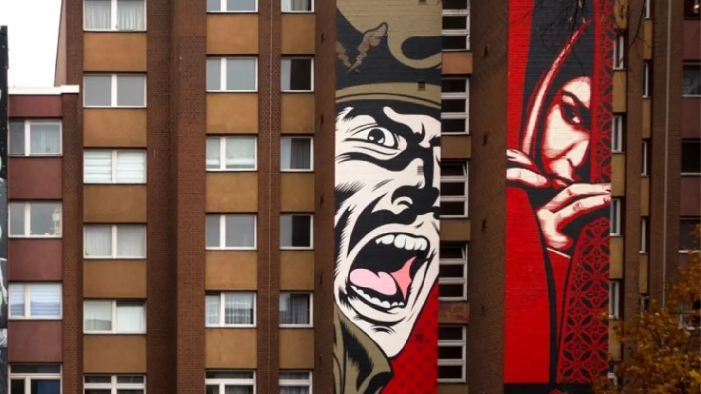 Two artworks by Shepard Fairey along Bülowstrasse in Berlin