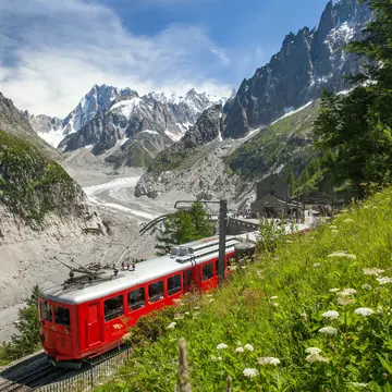 The cherry-red Train du Montenvers in the French Alps. Julia Kuznetsova/Shutterstock