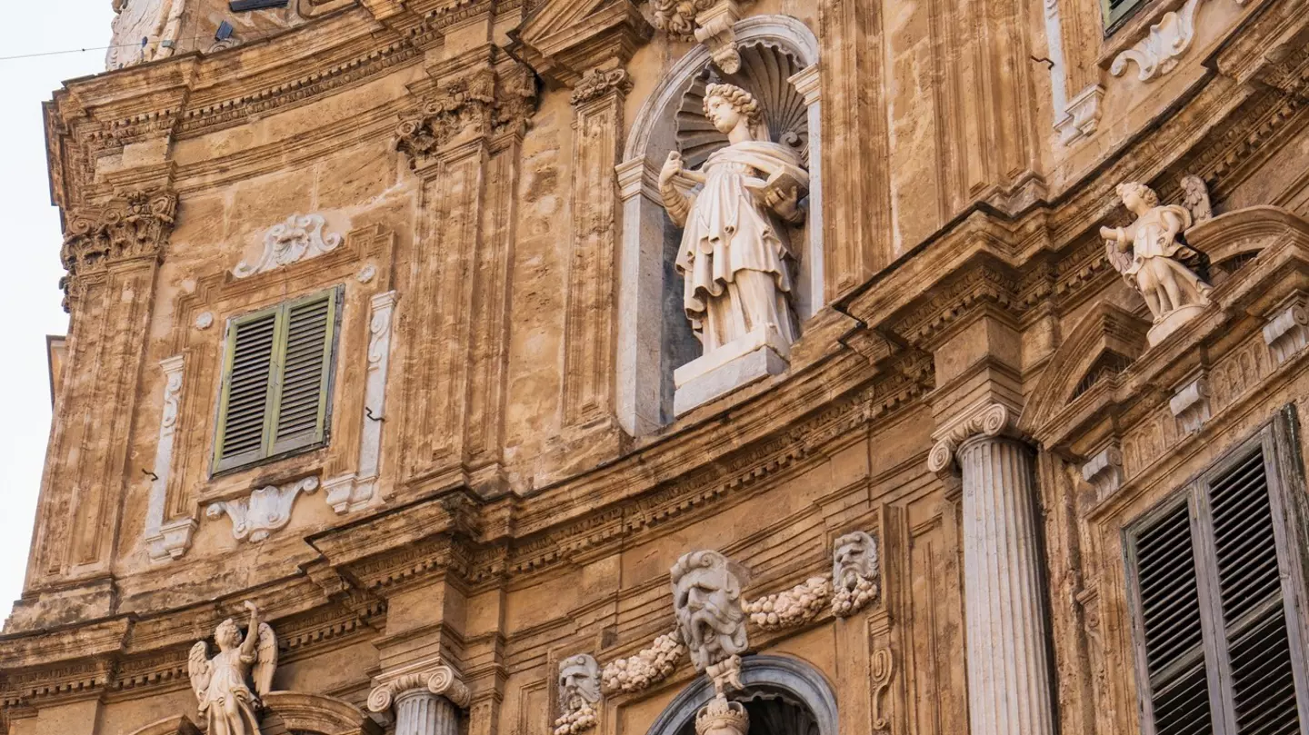 Facade at Quattro Canti square in Palermo on a sunny summer day.