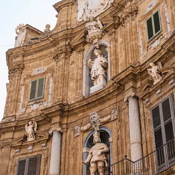 Facade at Quattro Canti square in Palermo on a sunny summer day.
