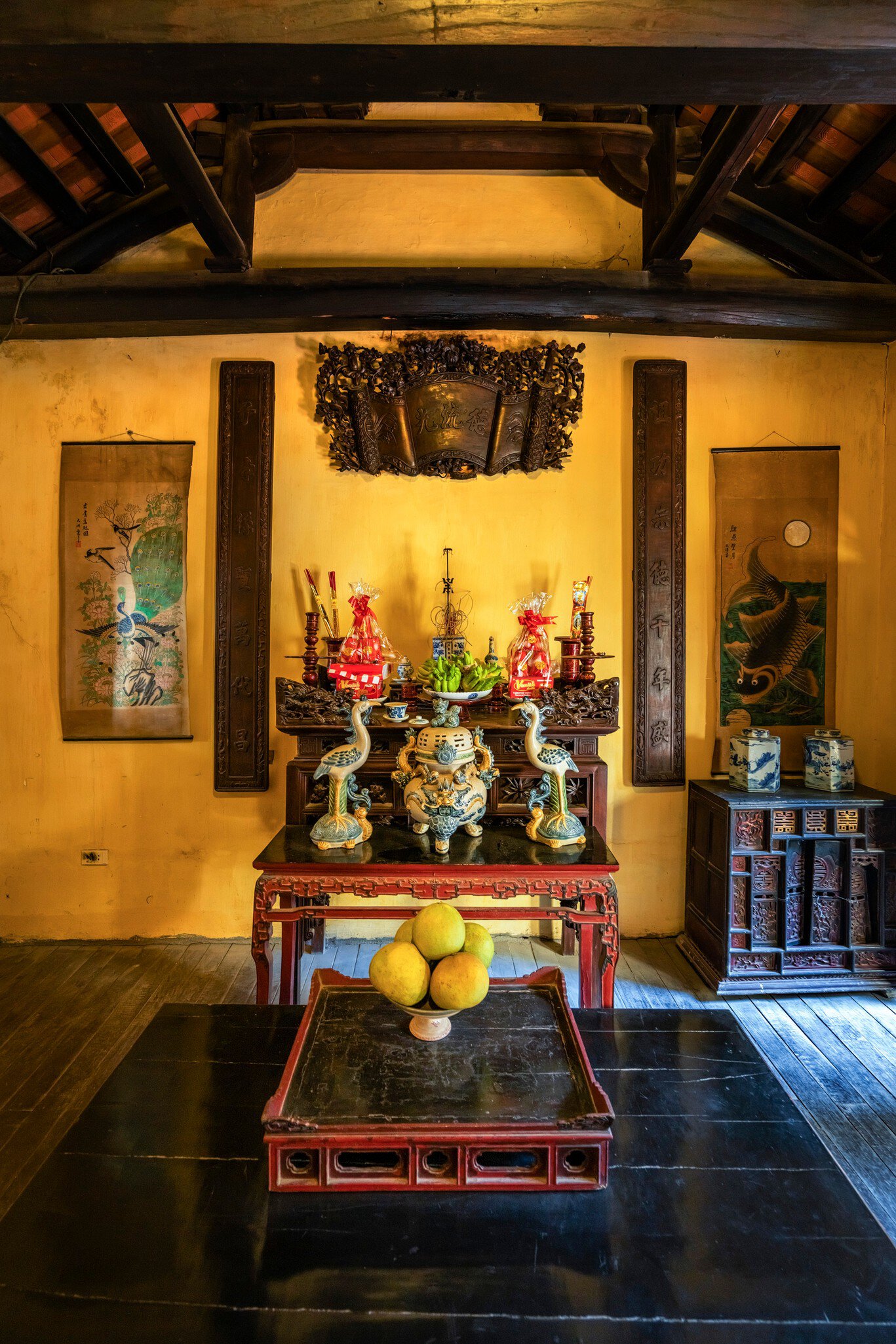 The colorful interior of the Ma May Street old house in Hanoi, Vietnam.
