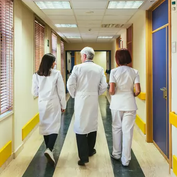 Medical team walking in the hospital corridor  Stocksy_txpa5dfce96J5E300_Medium_1633222 rfc.jpg