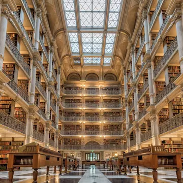 Across the country, masterpieces of civic architecture like Baltimore’s George Peabody Library enlighten and inspire © Andrea Izzotti / Shutterstock