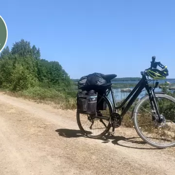 Pedaling past serene lakes and ancient forests helped our writer slow down © Amy Lynch / Lonely Planet