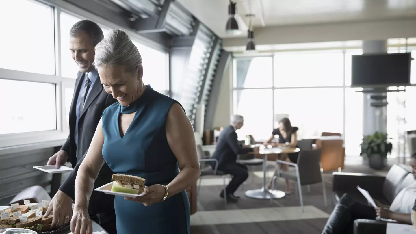 Women stand near VIP area backstage
