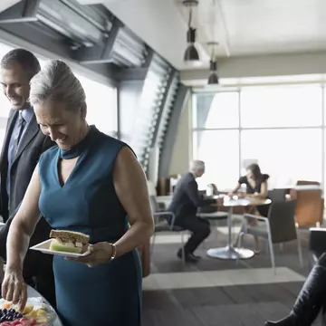 Women stand near VIP area backstage