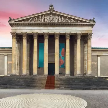 Munich's Staatliche Antikensammlungen, State Collection of Antiques, is housed in a Neoclassical building with Corinthian columns.