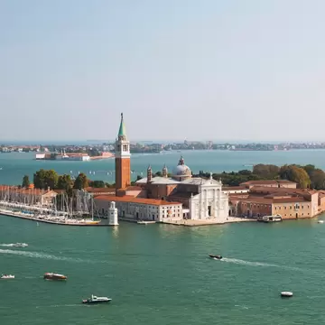 Aerial view of the Benedictine church of San Giorgio Maggiore on Isola di San Giorgio Maggiore in the Venetian lagoon in Italy.