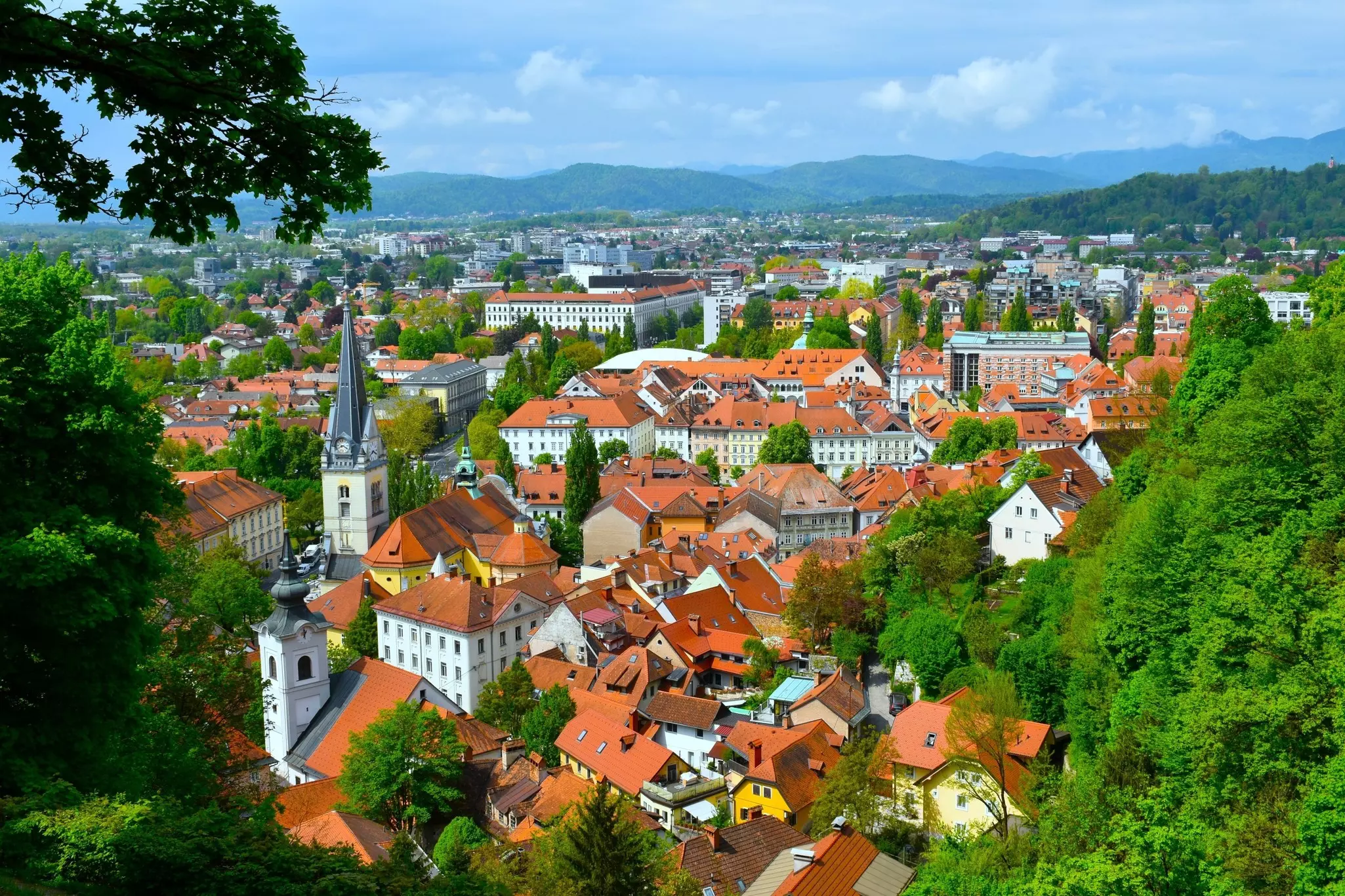 View of the Old Town of Ljubljana with church towers and red roofs