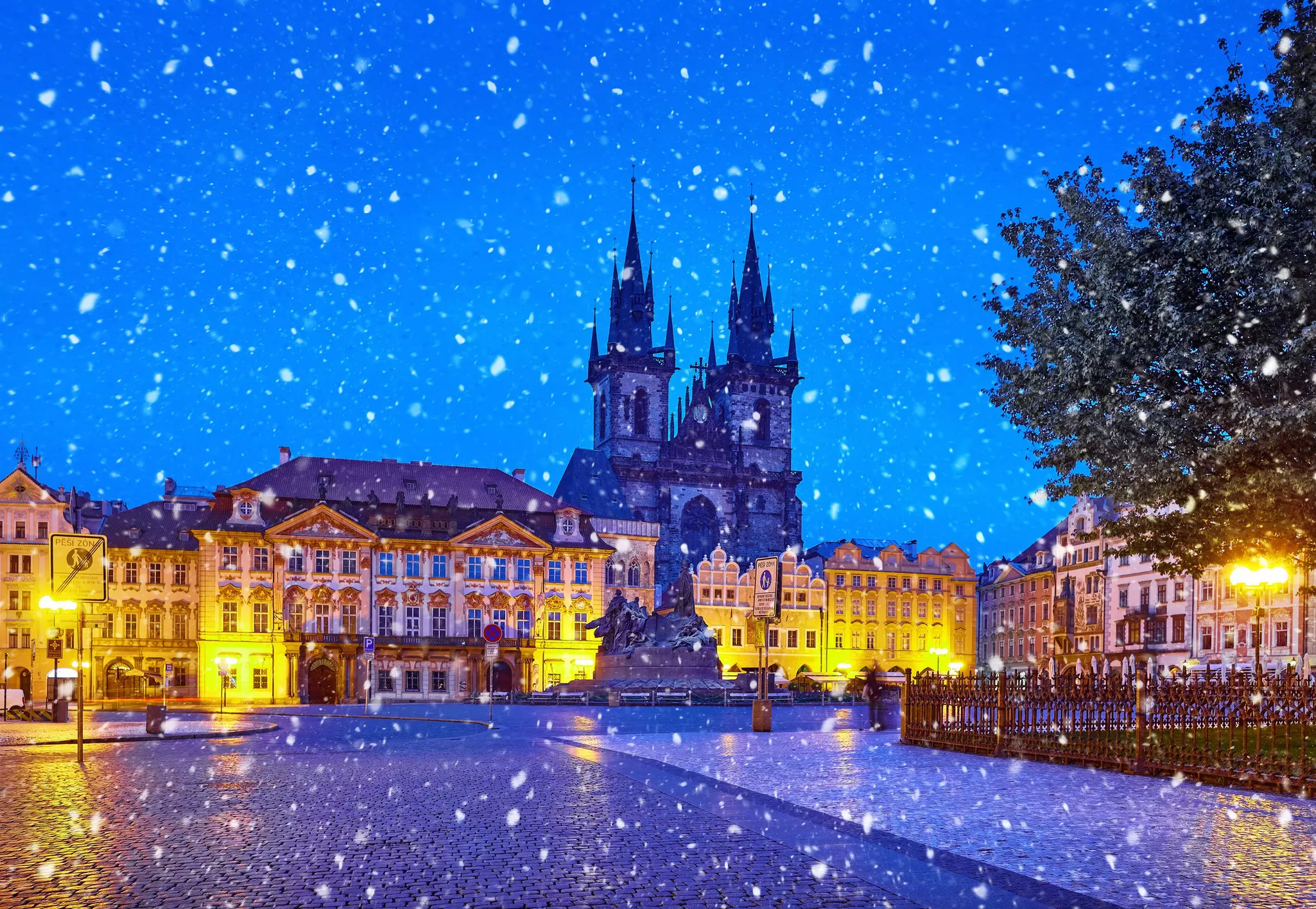 When the winter snow falls, make your way to Black Angels Bar for a cocktail in the Old Town Square © Yasonya / Getty Images