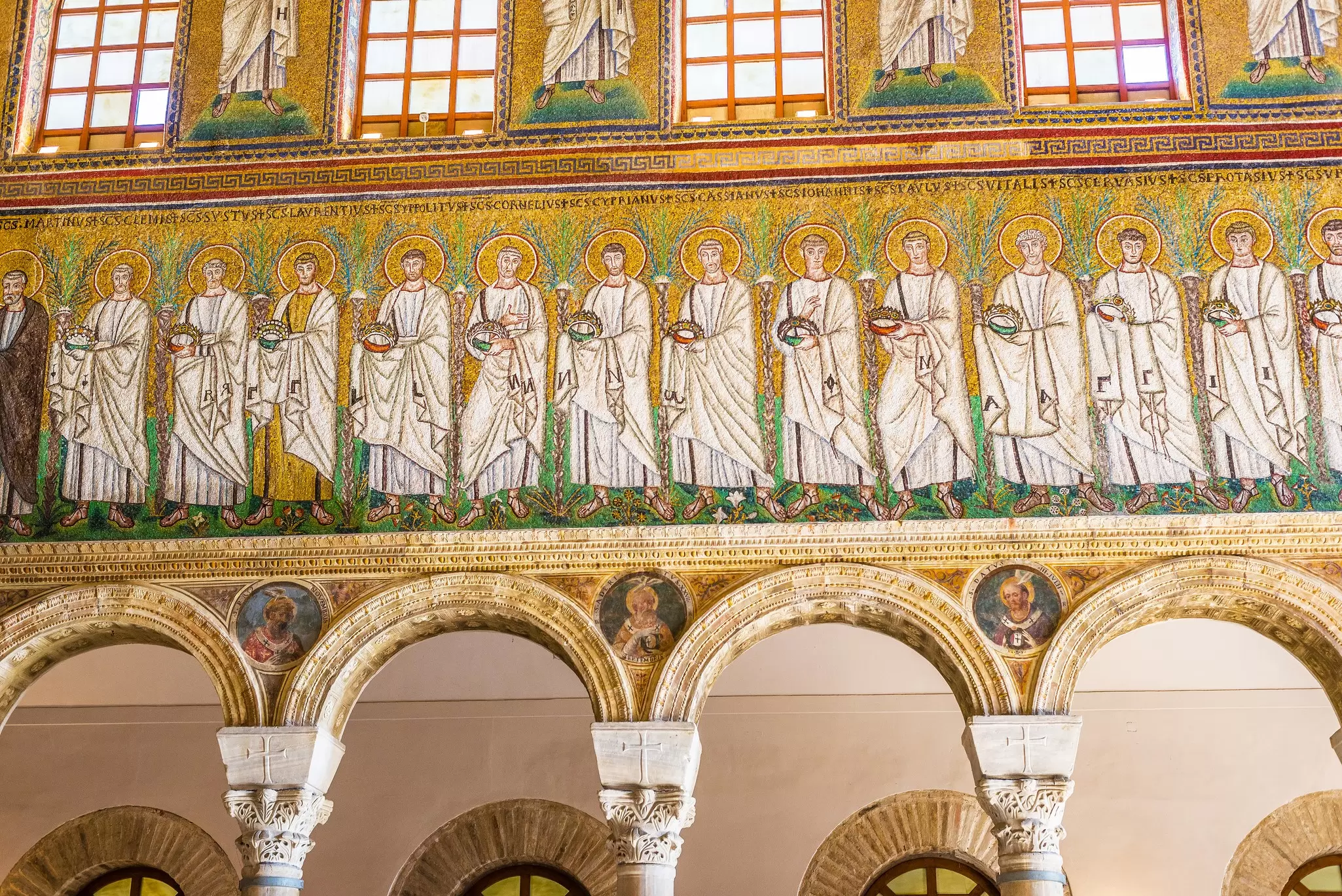 A mosaic on the right side wall of the nave of the Basilica of Sant Apollinare Nuovo in Ravenna, Italy.