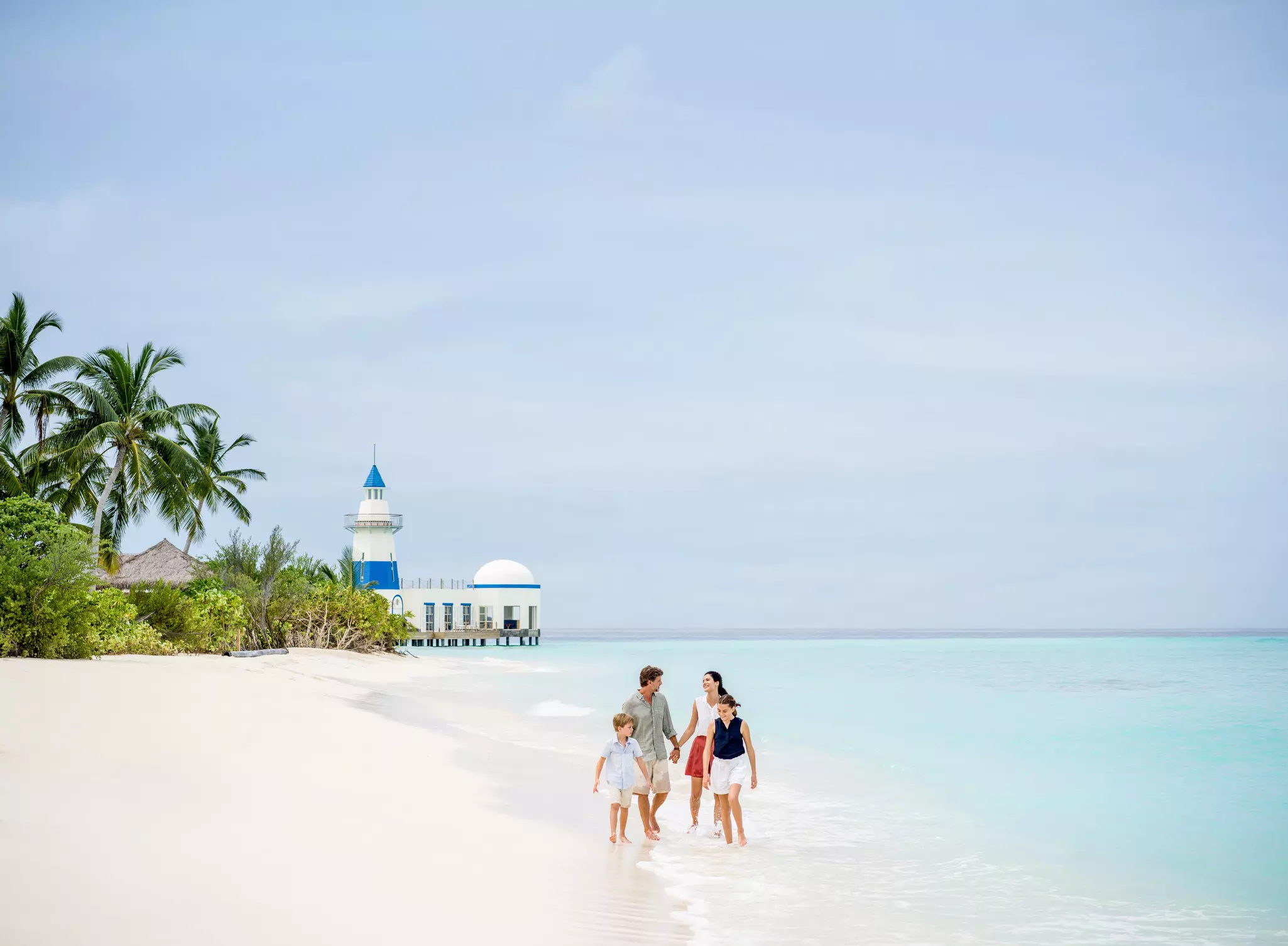 The brightly painted lighthouse at the InterContinental Maldives Maamunagau Resort makes for one of the Maldives’ most photogenic beaches © courtesy InterContinental Maldives Maamunagau Resort