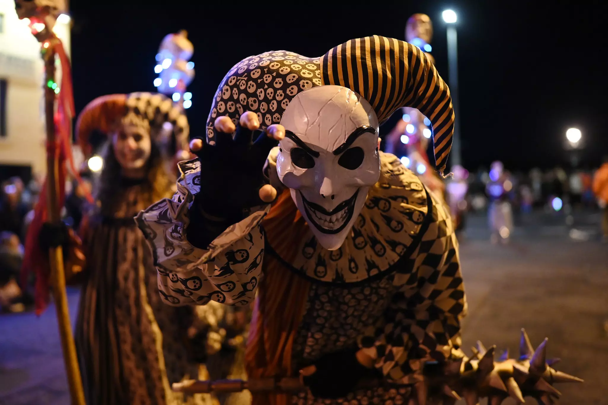 Performers dressed in elaborate costumes in the annual Halloween Festival parade in Derry City.
