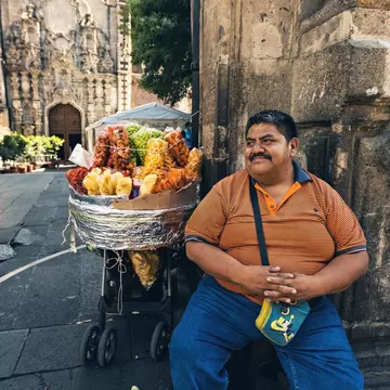 A vendor selling homemade potato chips on the street of Mexico City. Sun_Shine/Shutterstock