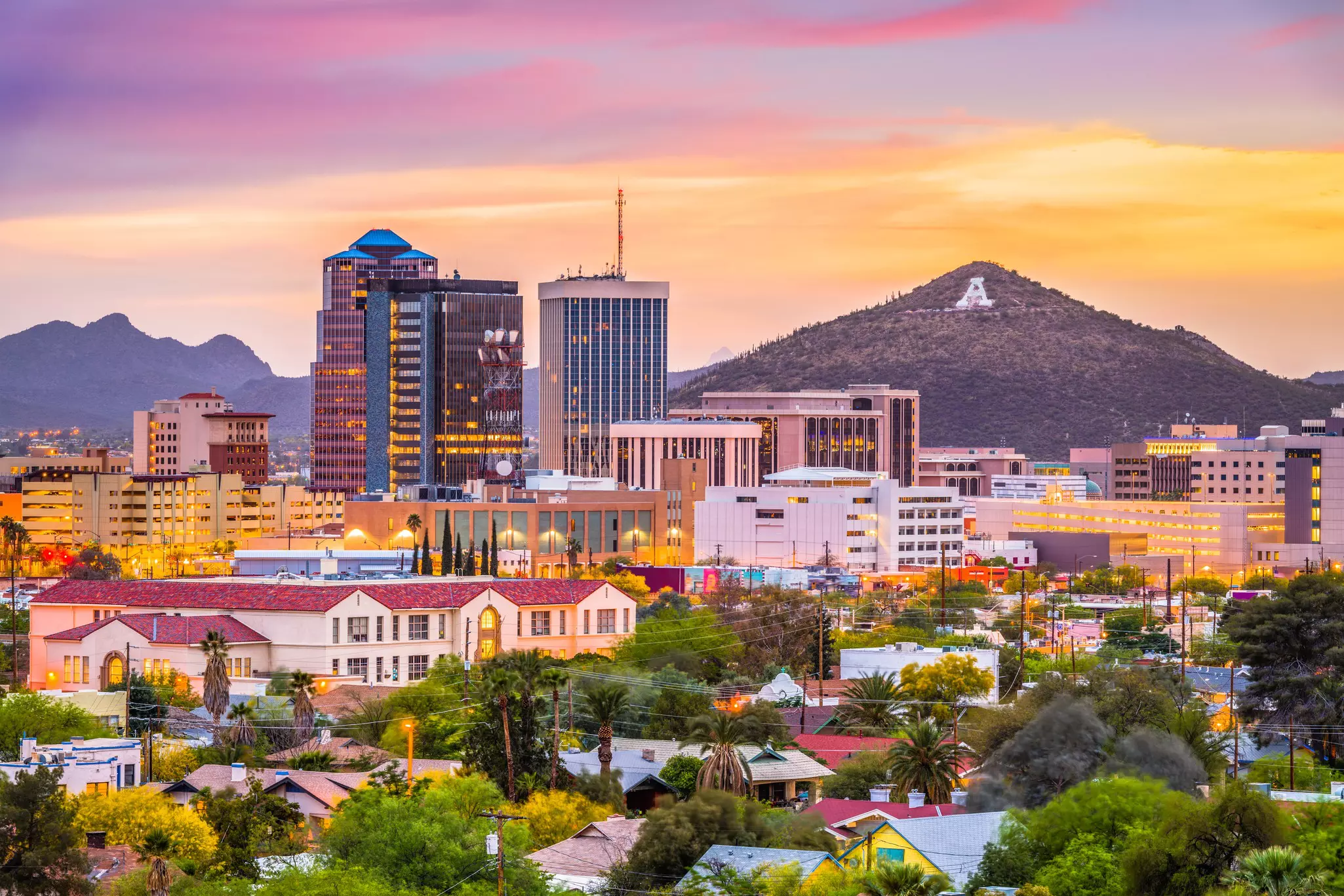 Tucson, Arizona, downtown skyline with Sentinel Peak at dusk.