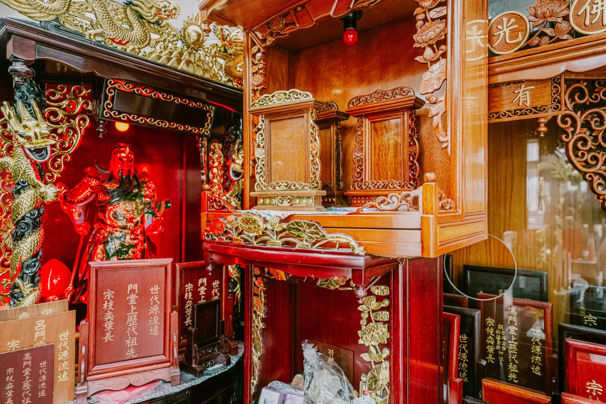 Wooden sculptures in a display case in Hong Kong