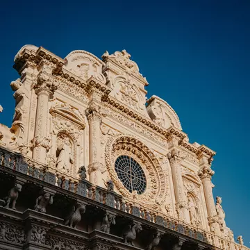 Basilica di Santa Croce lit up by the sun in Lecce, Italy