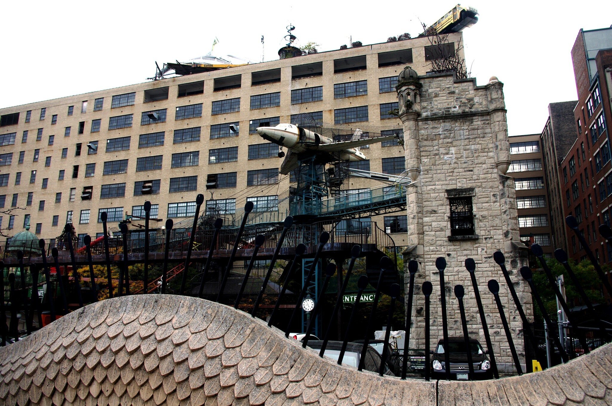 Saint Louis, Mo—November, 3, 2017, view of the playground at the City Museum with airplane tower and hanging school bus.; Shutterstock ID 748639639;