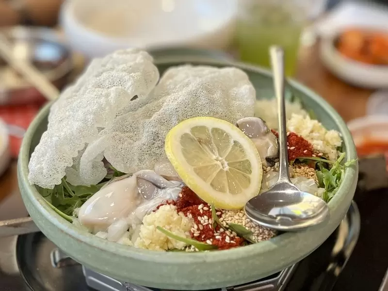 A bowl of Koren oyster salad