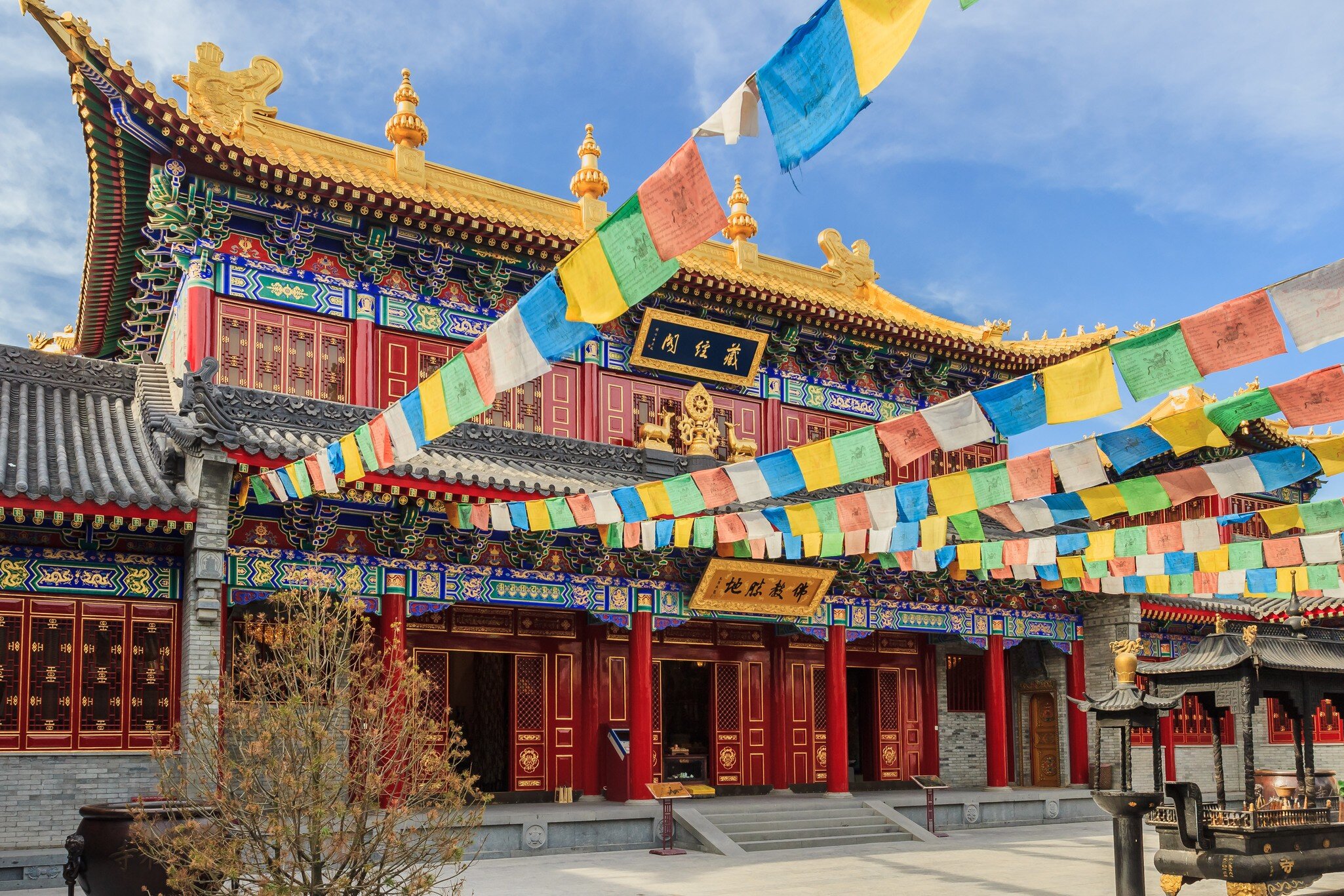 Guangren temple in Xi'an, China is the only Gelug temple in Shaanxi Province.The inscription on the plaque is Sutra Pavilion, a Buddhist holy land
1656090325
ancient architecture, antique architecture, antique courtyard, architecture, asia, asian, belief, blue, blue sky, buddha hall, buddhism, buddhist resort, calligraphy, china, culture, drum tower, gelug sect, gold, golden yellow, inscription, lama temple, landmark, lettering, mountain wall, old, plants, red, religion, religious architecture, roof ridge, royal temple, scenic spot, shaanxi, sunny, sunshine, sutra pavilion, tantrism, temple hall, tibet, tibetan buddhism, tibetan style, tourism, tradition, travel, trees, writing, xi'an