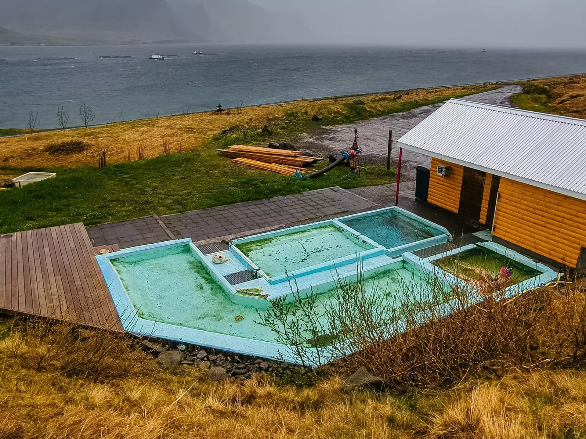 Hot pot, hot water pool, geothermal bath, bathers, Pollurinn, Talknafjoerour, Vestfiroir, Westfjords, North-West Iceland, Iceland, License Type: media, Download Time: 2025-11-24T19:05:45.000Z, User: comptonsheldon109, Editorial: false, purchase_order: 56530 - Guidebooks, job: Global Publishing WIP, client: Experience Iceland 2, other: Compton Sheldon
