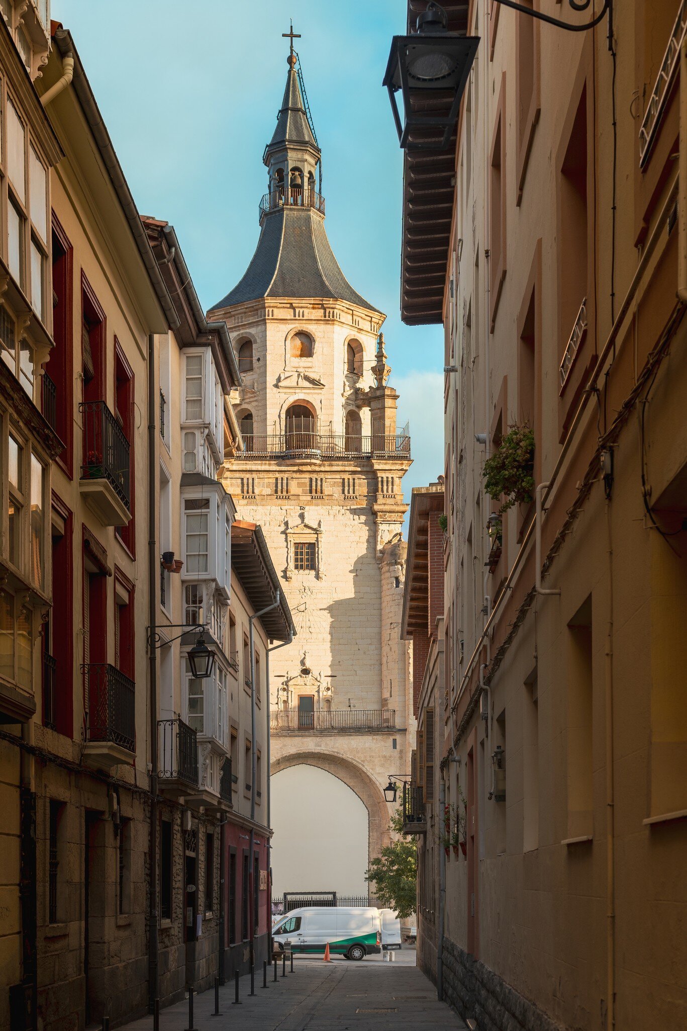 View down an alley of the tower of the Catedral de Santa María in Vitoria, Spain.