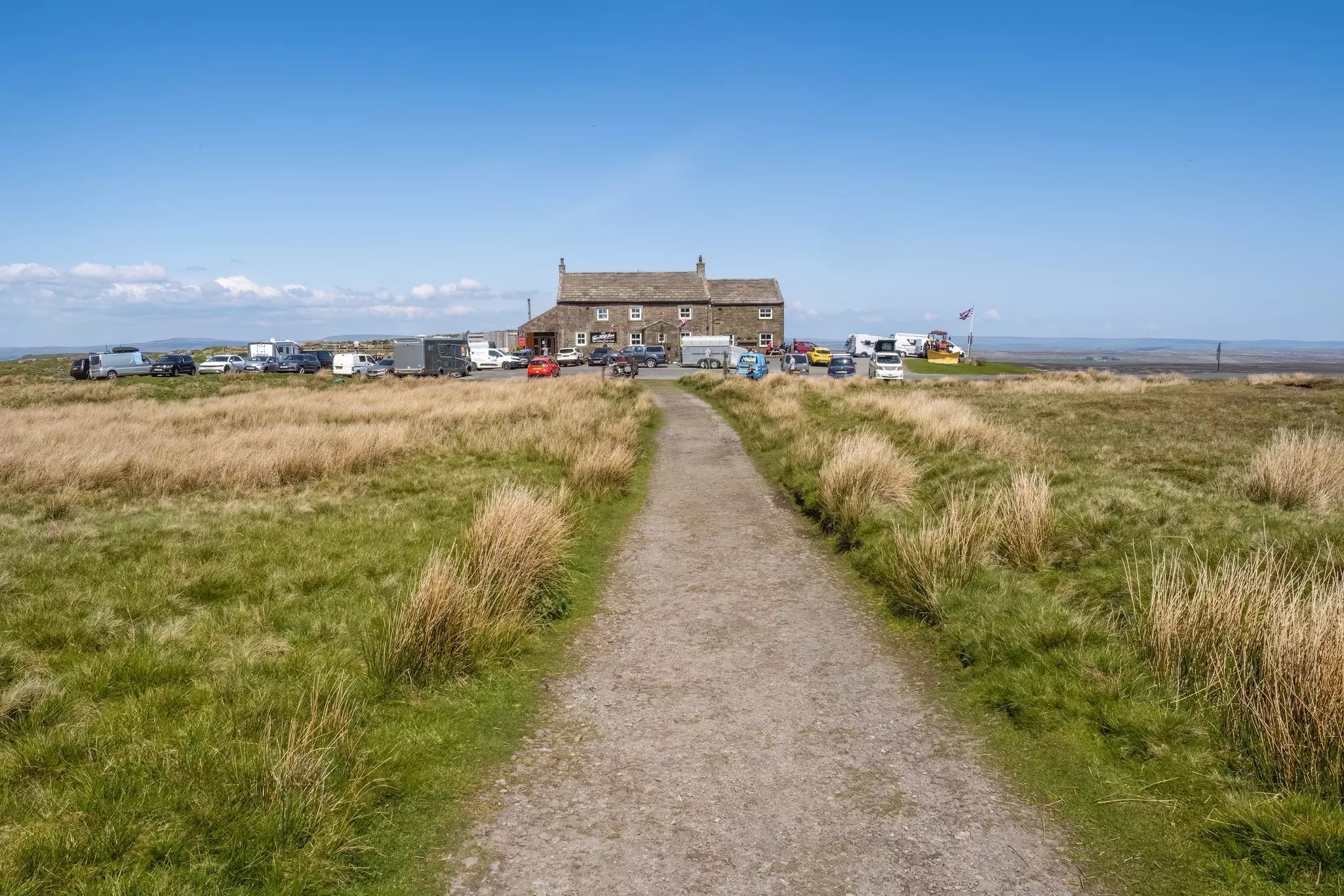 A view towards the isolated Tan Hill Inn in Yorkshire Dales National Park, England.